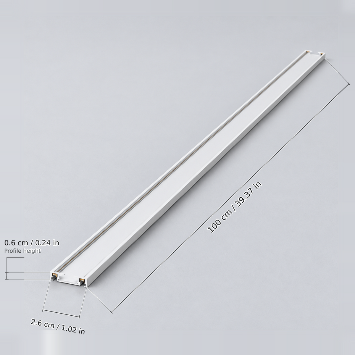 White length 100 cm (surface rail) with dimension lines in centimetres and inches: Length 100 cm / 39.37 in; Width 2.6 cm / 1.02 in; Profile height 0.6 cm / 0.24 in.