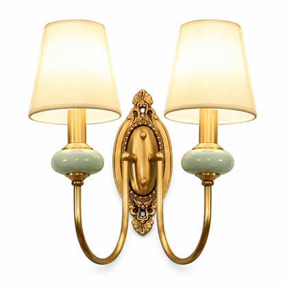 Luxury copper wall lamp with fabric shades on a clean white background