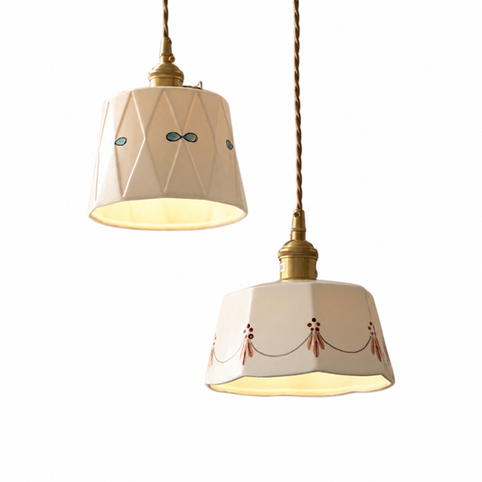 Japanese brass glazed ceramic pendant light on a clean white background