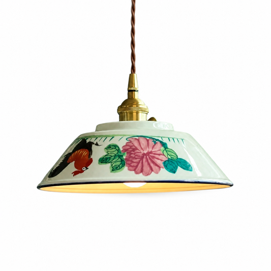 Vintage ceramic LED pendant lamp with brass fitting on a clean white background
