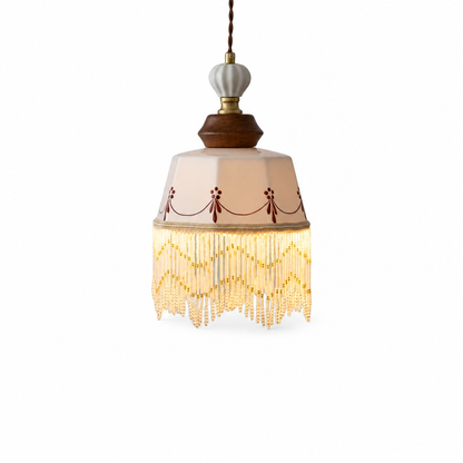Copper wood pendant with white ceramic tassel on a clean white background