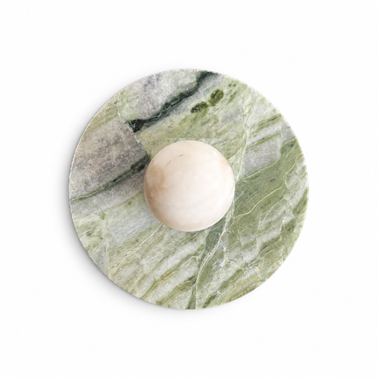 Marble alabaster wall sconce lamp on a clean white background